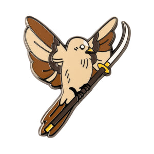 An enamel pin of a tan and brown sparrow in flight, holding a glaive weapon on a white background.
