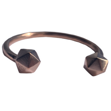 Load image into Gallery viewer, Rose gold D20 Dice bangle on white background.