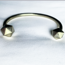 Load image into Gallery viewer, Champagne Satin D20 Dice bangle on white background.