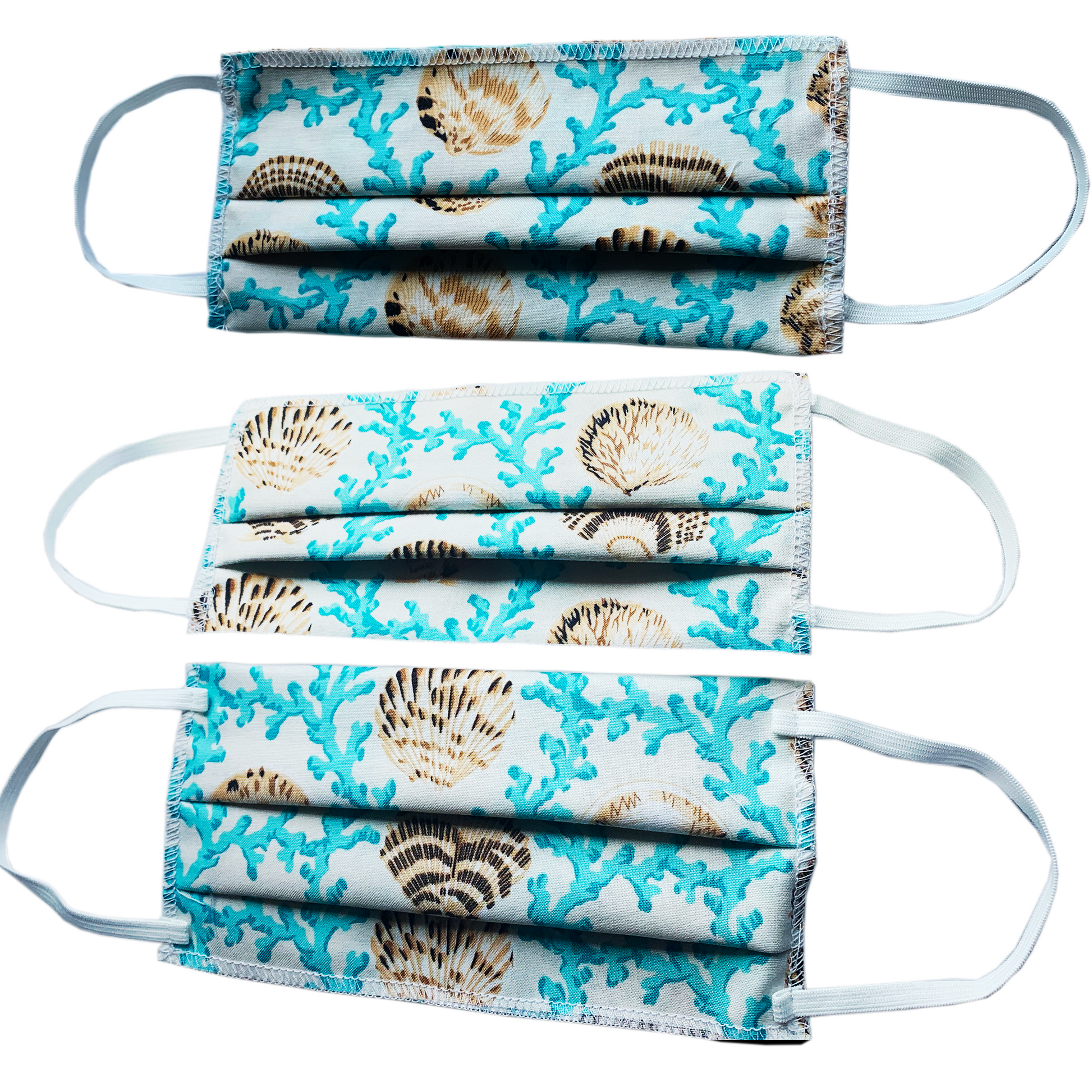 Three seashells masks on white background.