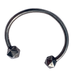 Oxidized Silver D20 Dice bangle on white background.