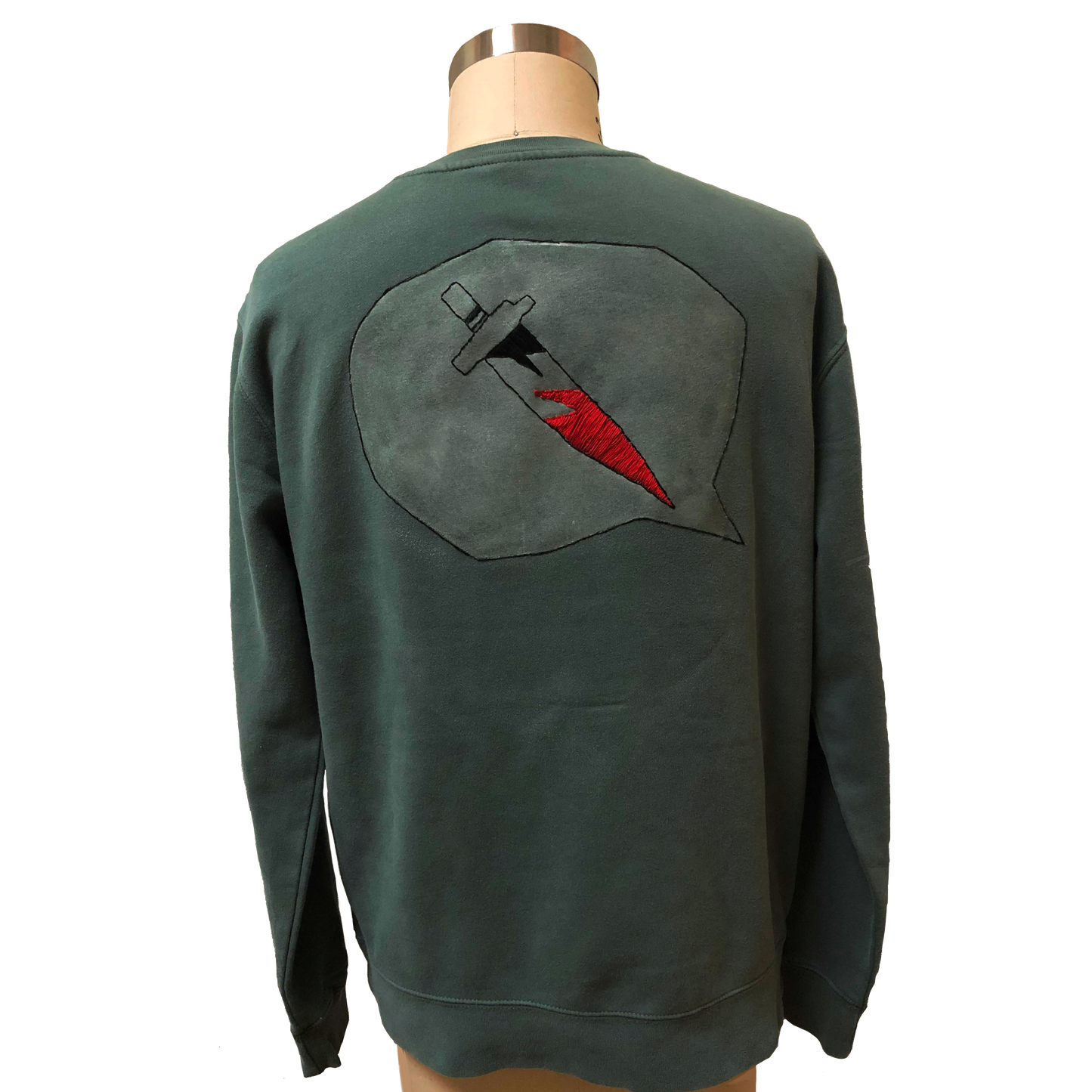 Back view of Snaek Attack sweater that depicts a bloody knife in a speechbubble.