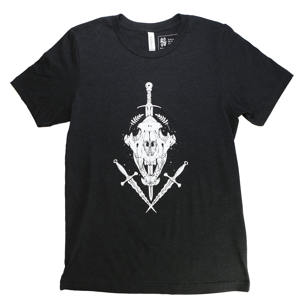 Black T-shirt with white illustration of front-facing, laurel crowned tiger skull pierced by a sword and flanked by a pair of daggers.