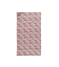 Load image into Gallery viewer, Tea towel featuring pattern of feathers and different griffins lounging and playing on white background.