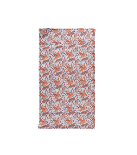 Tea towel featuring pattern of feathers and different griffins lounging and playing on white background.