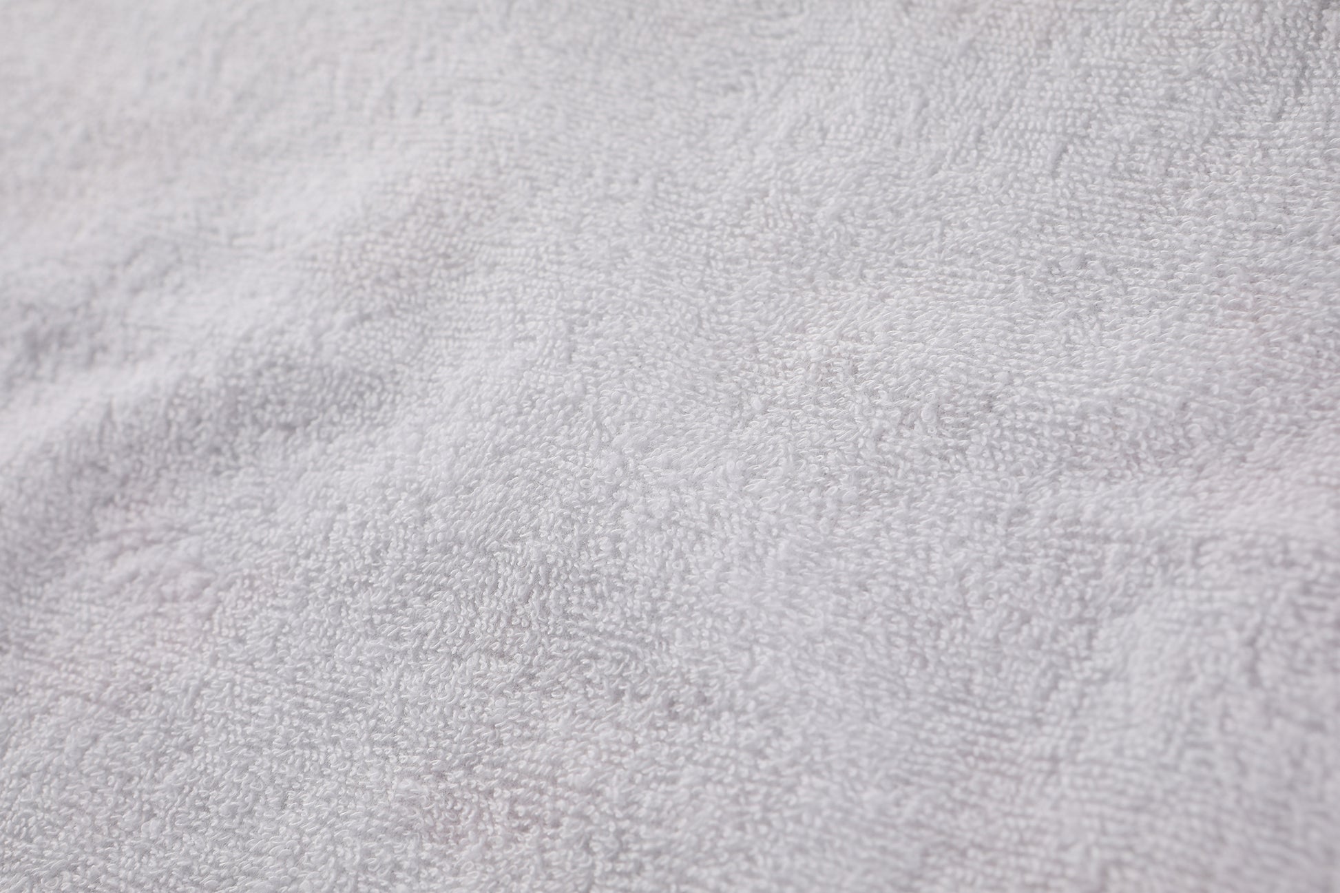 Closeup of white terrycloth lining.