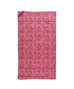 Tea Towel featuring pattern depicting different weapons in a pattern on pink towel.