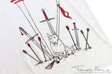 Load image into Gallery viewer, Closeup of light grey t-shirt, showing black and red outlined weapons embedded in the ground around a sitting Jump the dog.